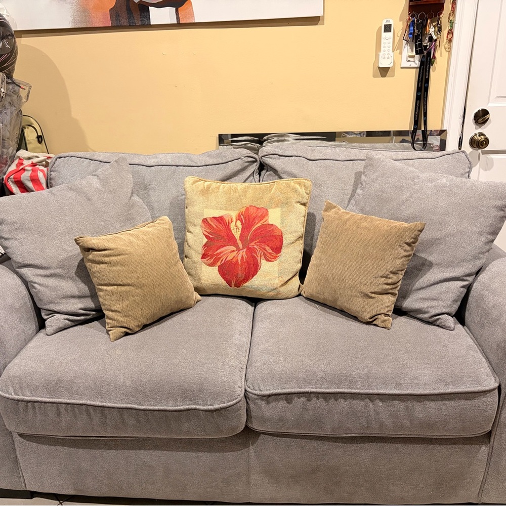 Beige Accent Pillow with Red Floral Motif